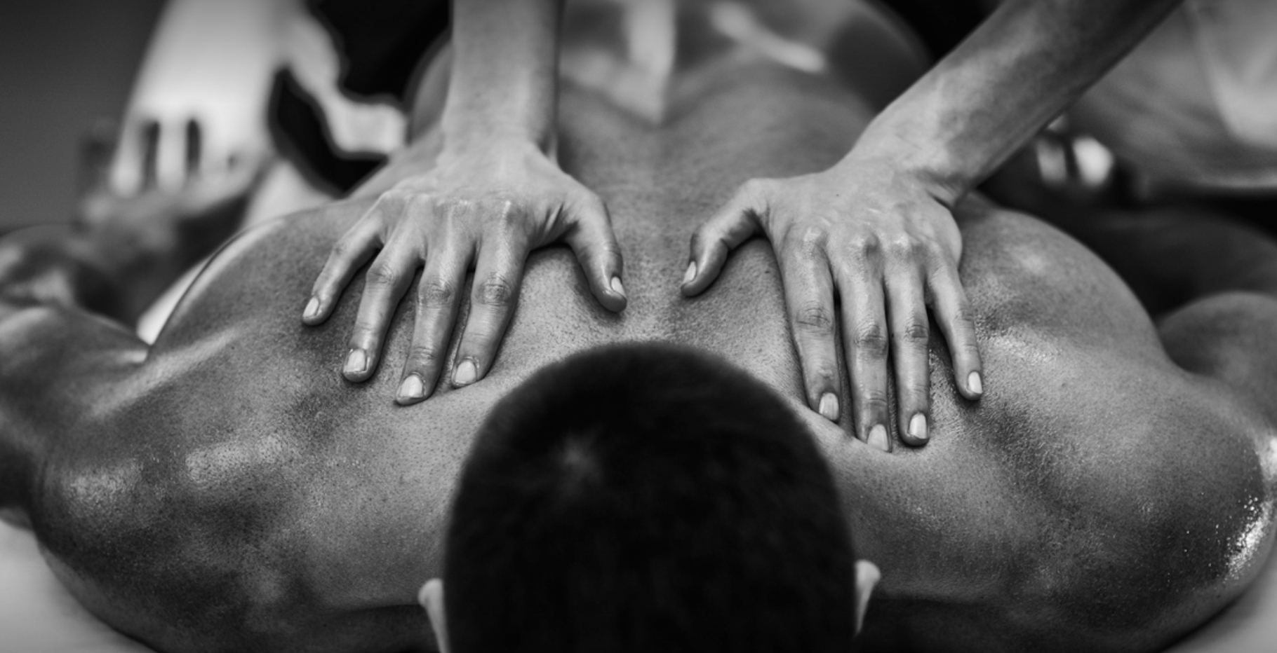 guy receiving massage at Absolutewax 4 Men