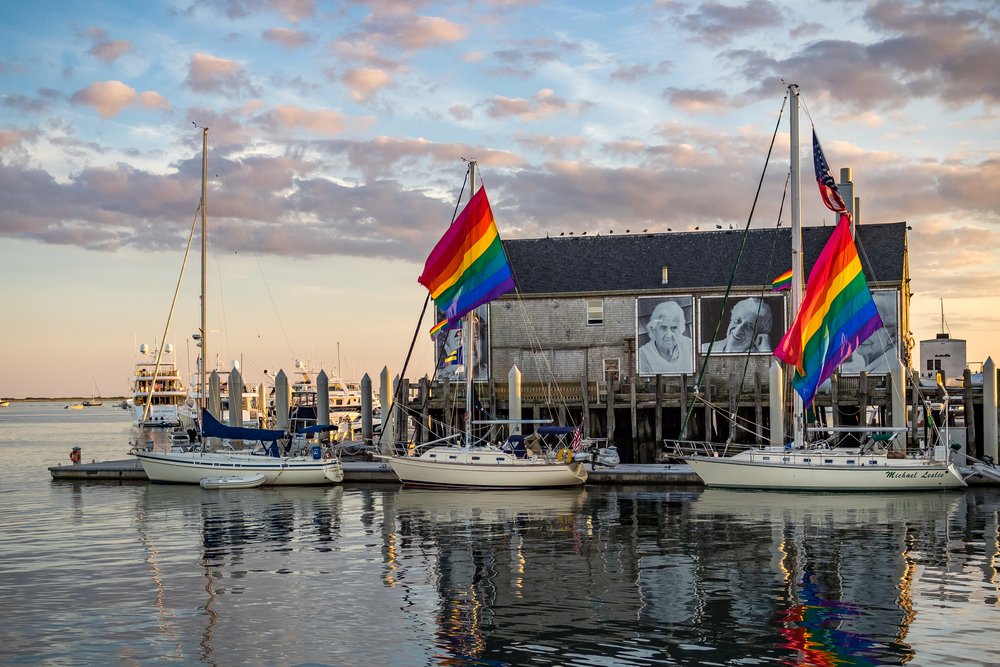 Boats and a decorated house in the Provincetown Marina.