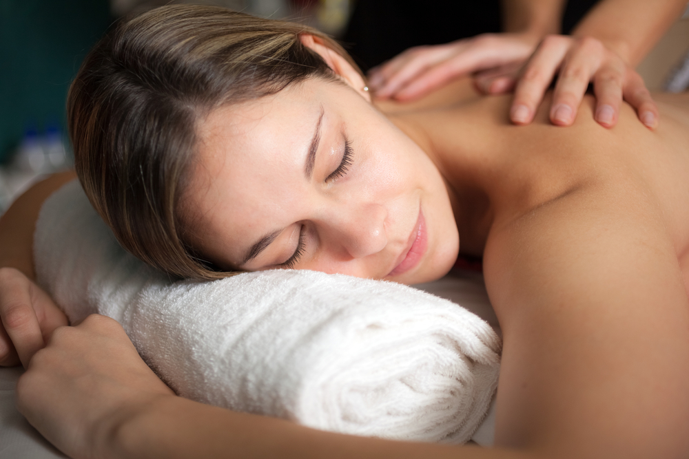 woman realxing back swedish massage